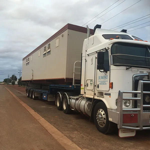 Juwest prime mover with a transportable building on a trailer